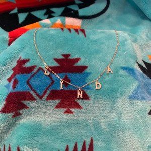 Brand NEW "Linda" Gold Colored Necklace with fake diamonds